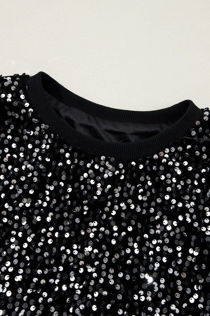 Sweater negro con lentejuelas – ¡Brilla con cada movimiento! ✨🖤