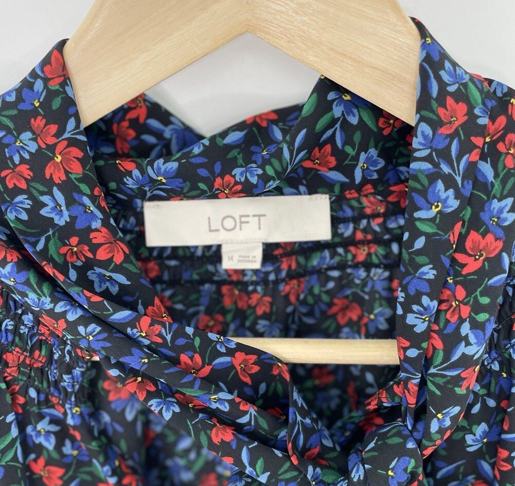 Blusa Floral Sin Mangas con Lazo – LOFT 🌸💙