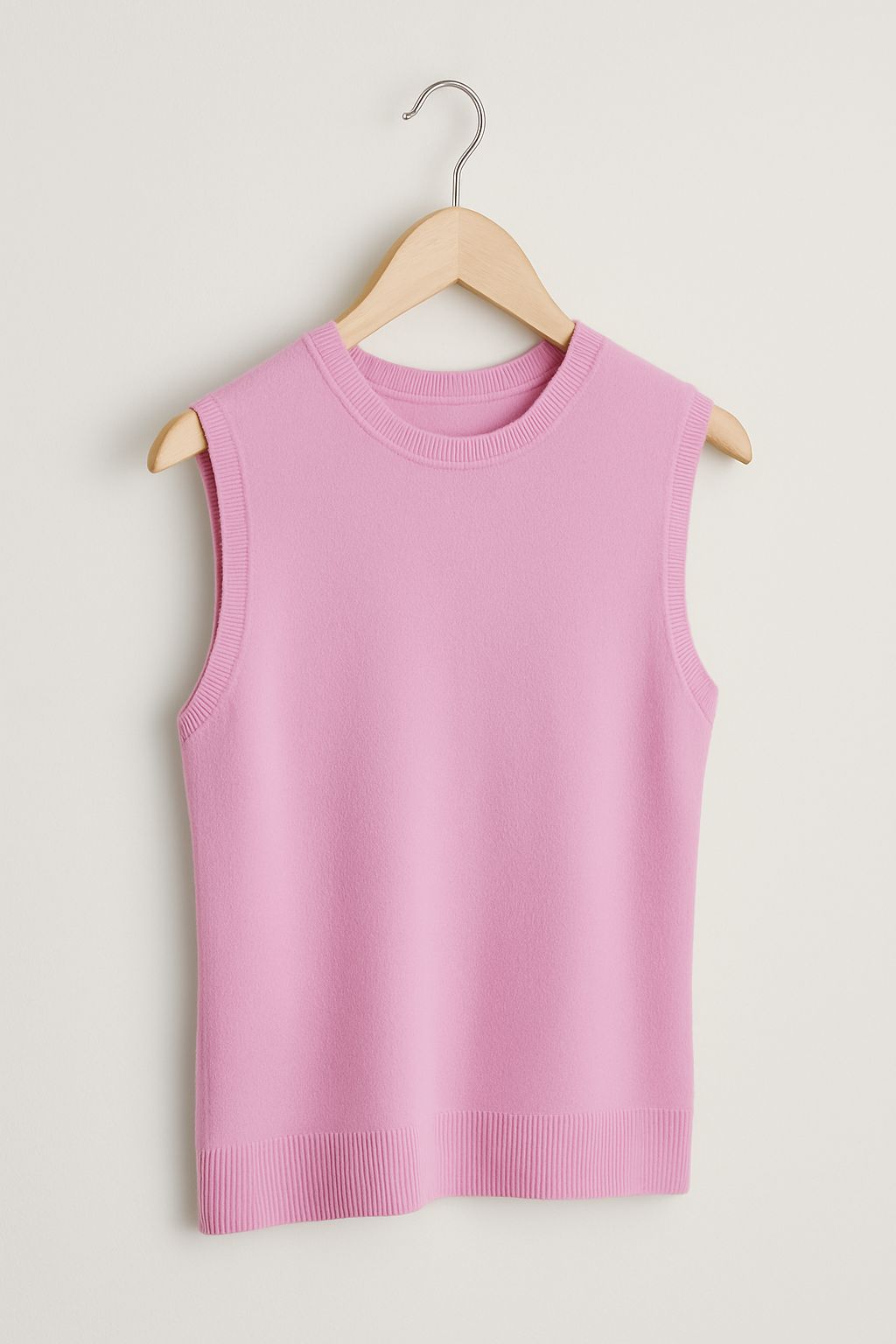 Blusasin mangas en tejido de punto rosa pastel – Elegancia suave para tu día