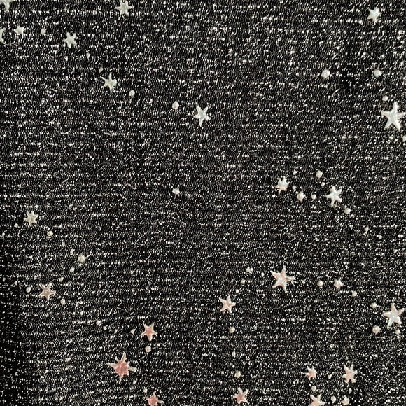 Blusa traslúcida de estrellas