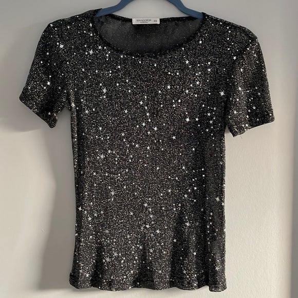 Blusa traslúcida de estrellas
