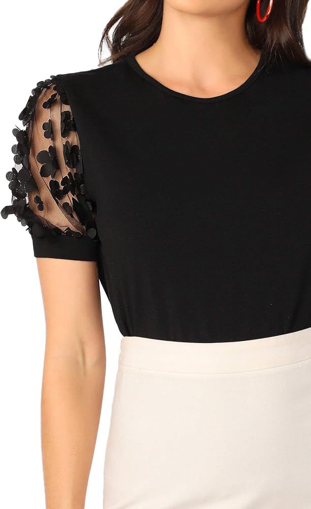 Blusa negra con mangas de tul bordadas – Toque elegante en cada detalle